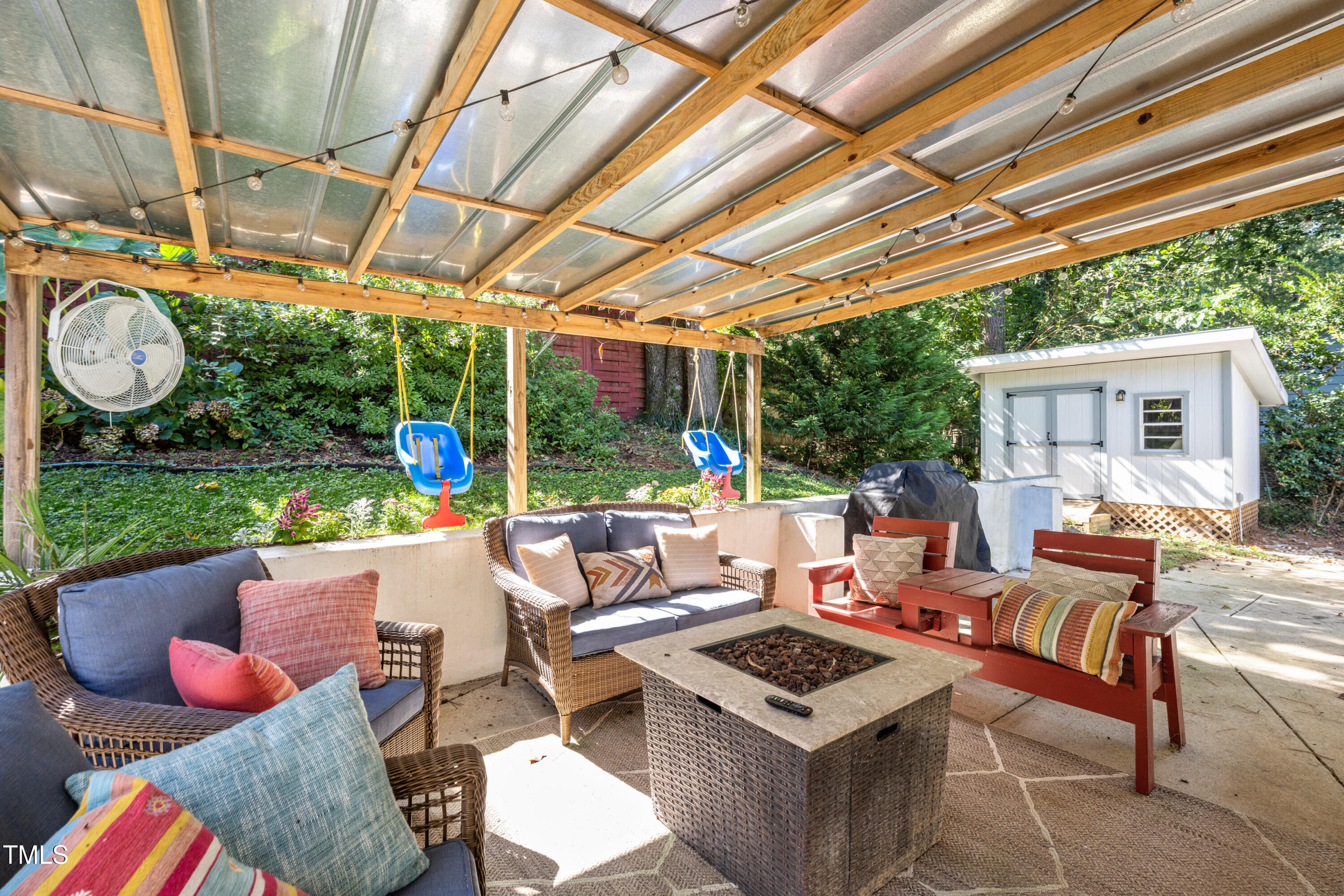 724 Hunting Ridge Road Raleigh, NC 27615 - Photo 21 of 24 a outdoor space with patio lots of furniture and garden view