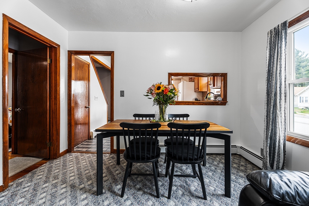 51 Cherry Street Fairhaven, MA 02719 - Photo 10 of 27 a view of a dining room with furniture window and wooden floor