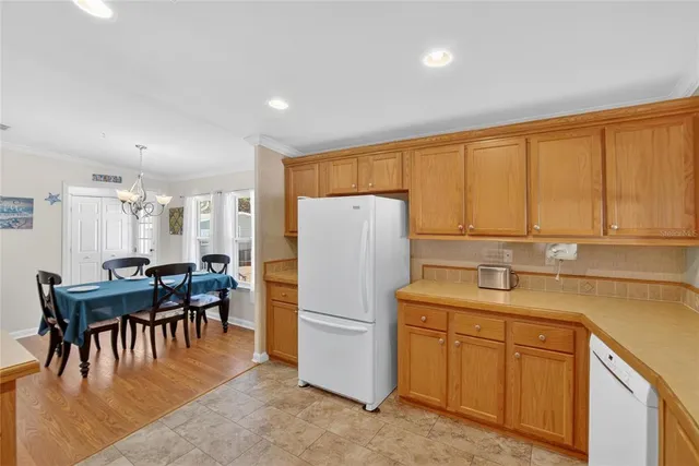 a spacious bedroom with a bed and a table