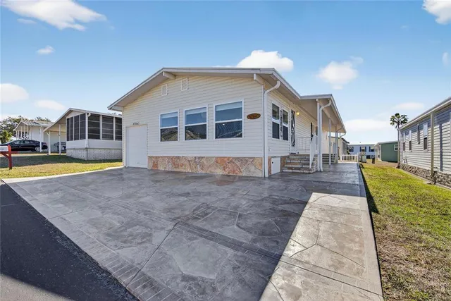 a view of a house with a swimming pool