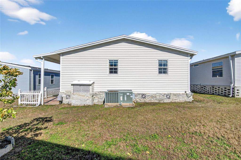 37526 Rio Lane Zephyrhills, FL 33541 - Photo 42 of 58 a house view with a outdoor space