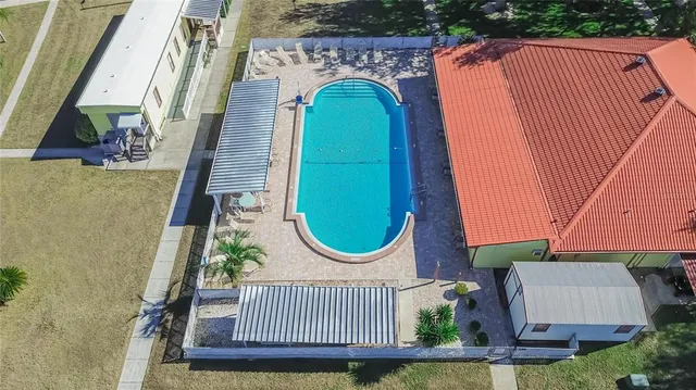 an aerial view of a house with a ocean view