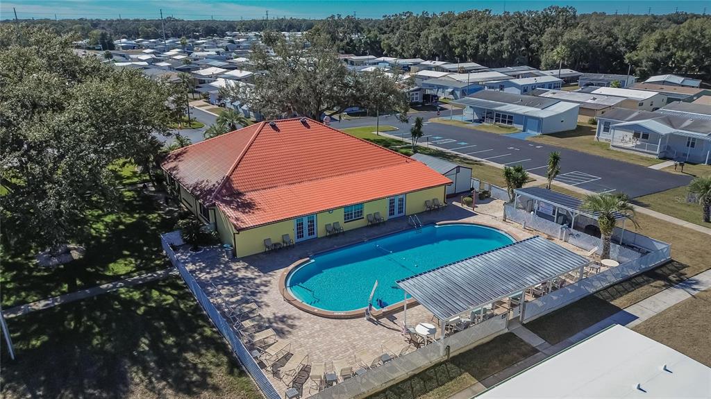 37526 Rio Lane Zephyrhills, FL 33541 - Photo 48 of 58 an aerial view of a house with a swimming pool