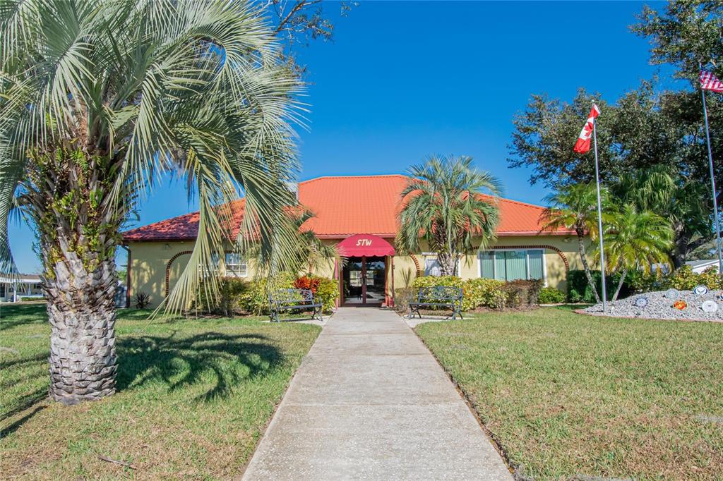 37526 Rio Lane Zephyrhills, FL 33541 - Photo 51 of 58 a front view of house with yard and green space