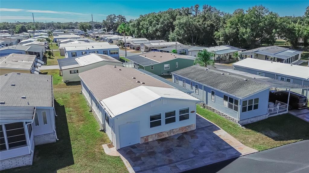 37526 Rio Lane Zephyrhills, FL 33541 - Photo 56 of 58 a aerial view of a house with a yard