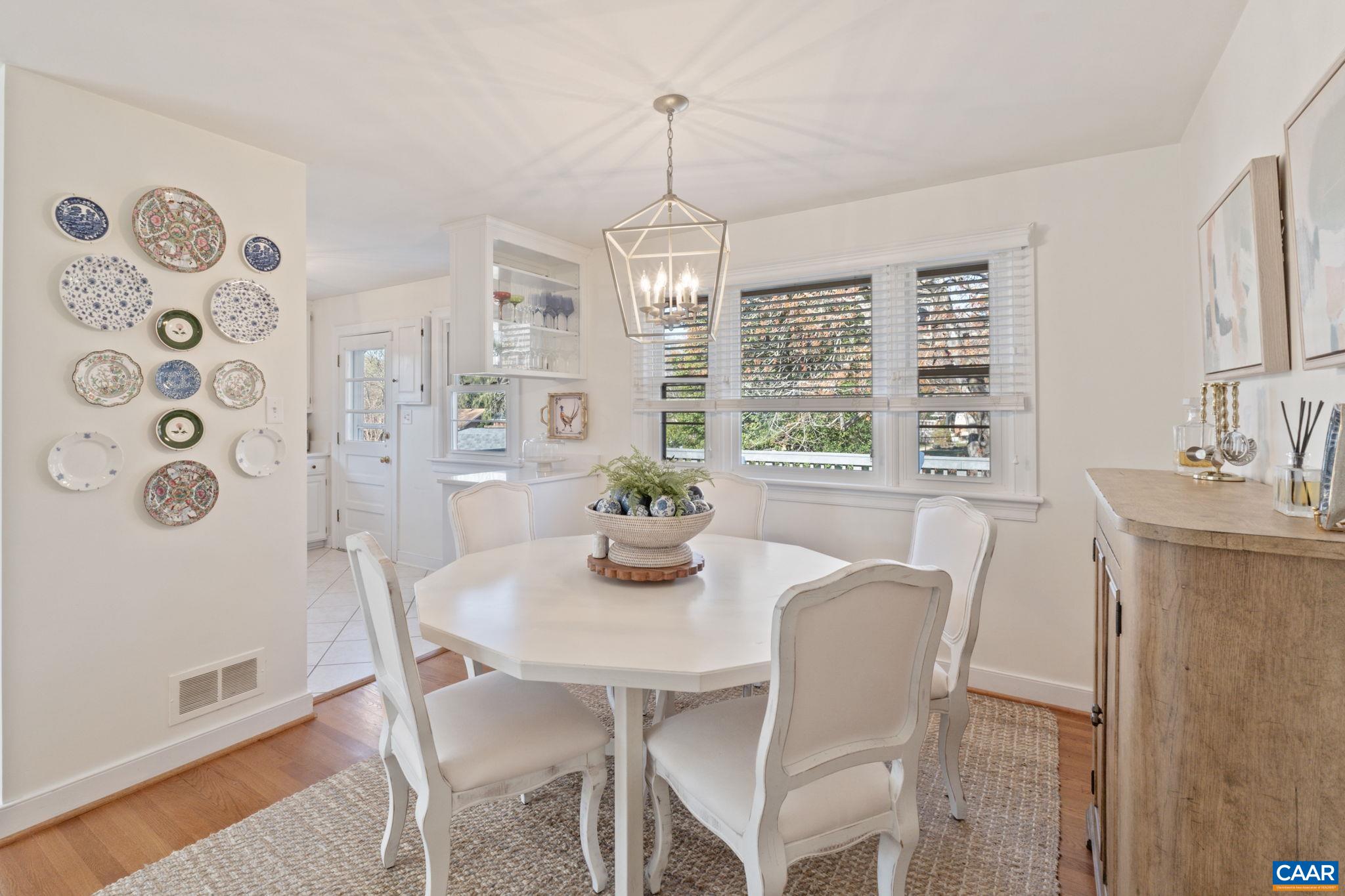 109 Camellia Drive Charlottesville, VA 22903 - Photo 11 of 49 a view of a dining room with furniture window and outside view