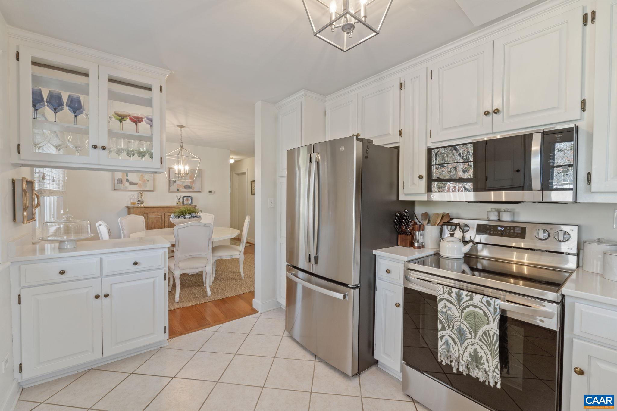 109 Camellia Drive Charlottesville, VA 22903 - Photo 15 of 49 a kitchen with cabinets stainless steel appliances and a counter space
