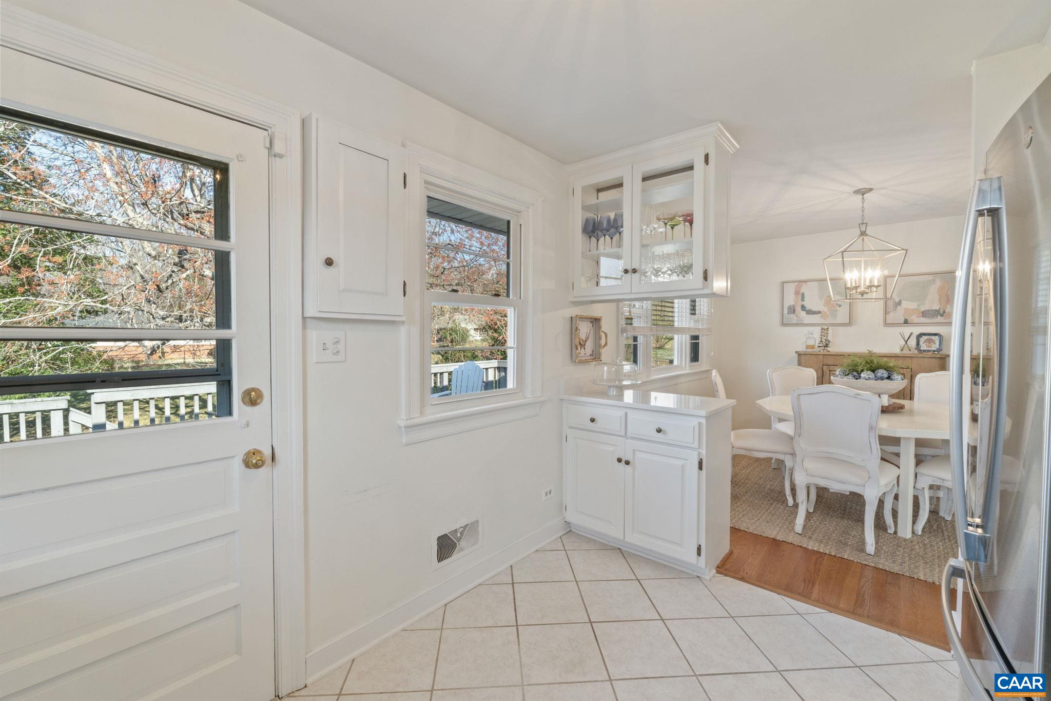 109 Camellia Drive Charlottesville, VA 22903 - Photo 16 of 49 a room with white cabinets and wooden floor