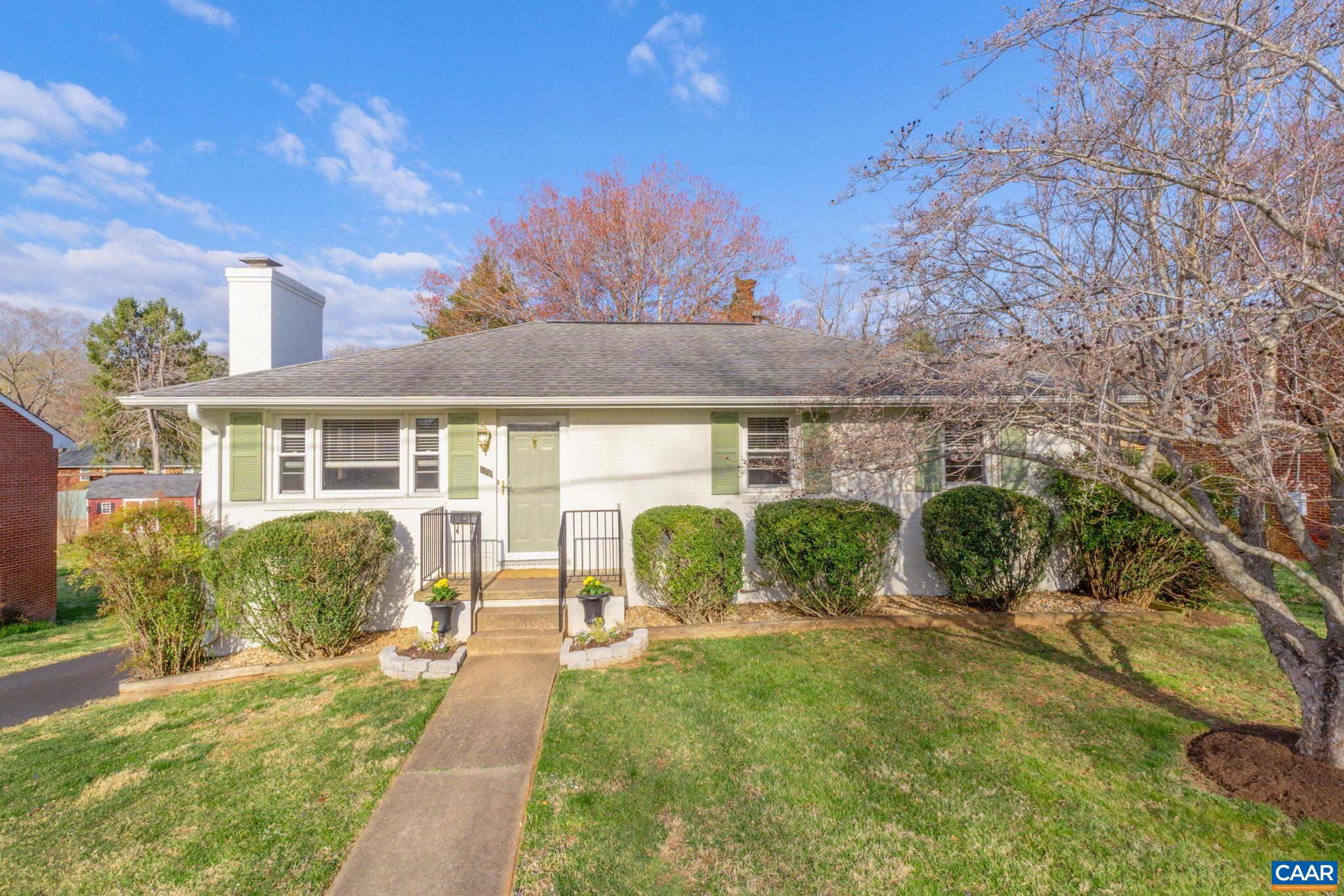 109 Camellia Drive Charlottesville, VA 22903 - Photo 2 of 49 a front view of a house with garden