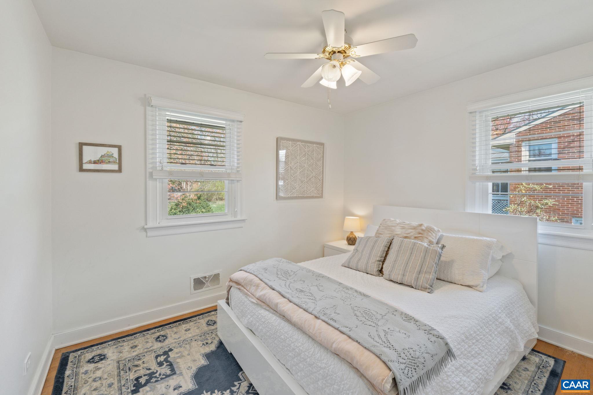 109 Camellia Drive Charlottesville, VA 22903 - Photo 21 of 49 a bedroom with a bed and a window