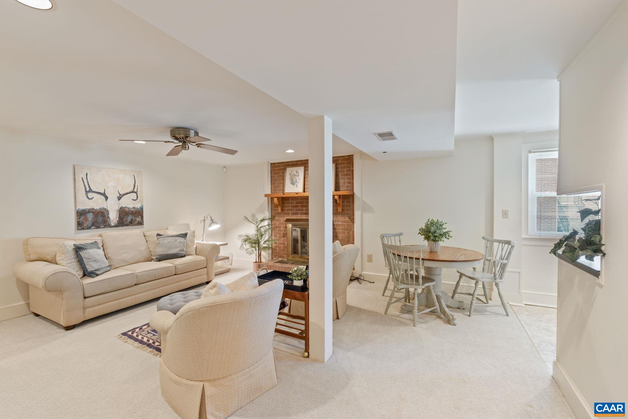 109 Camellia Drive Charlottesville, VA 22903 - Photo 24 of 49 a living room with furniture and a table