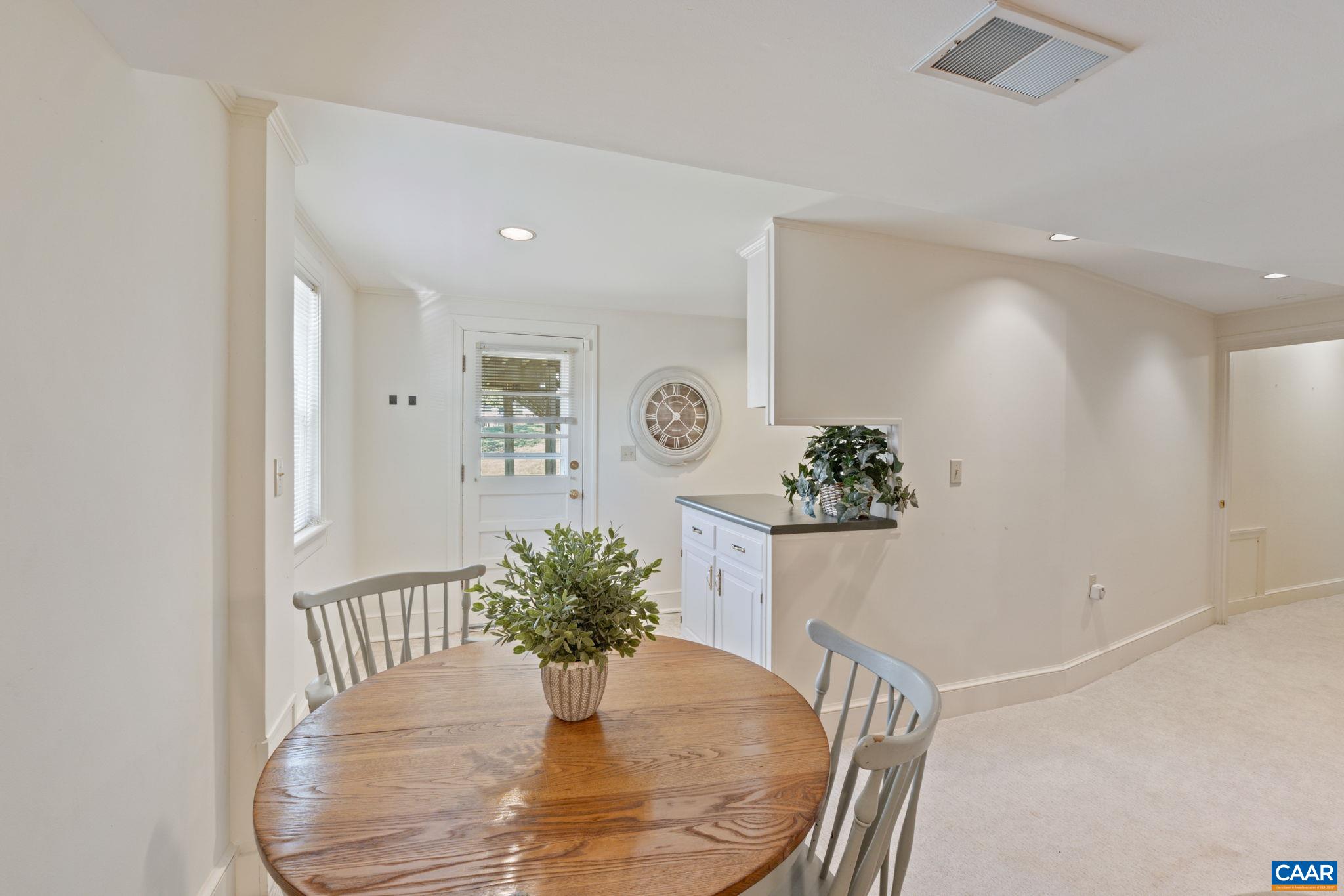 109 Camellia Drive Charlottesville, VA 22903 - Photo 26 of 49 a view of a dining room with furniture