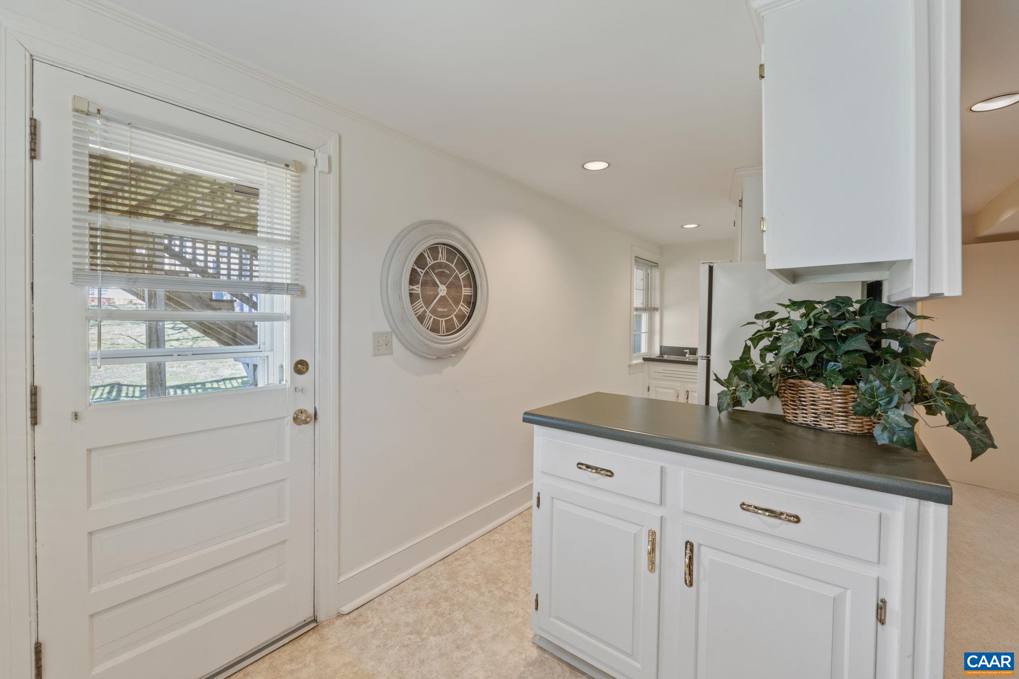 109 Camellia Drive Charlottesville, VA 22903 - Photo 28 of 49 a kitchen with cabinets and window