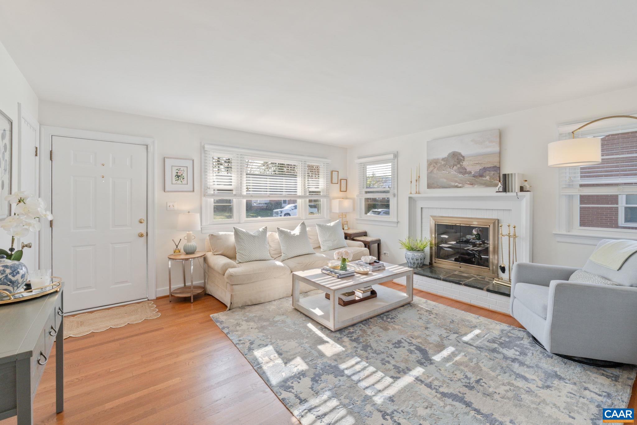 109 Camellia Drive Charlottesville, VA 22903 - Photo 5 of 49 a living room with furniture and a fireplace