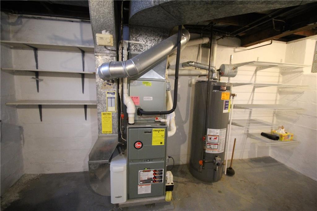 835 Middle Road Pittsburgh, PA 15234 - Photo 14 of 21 Basement with storage shelves and updated furnace.
