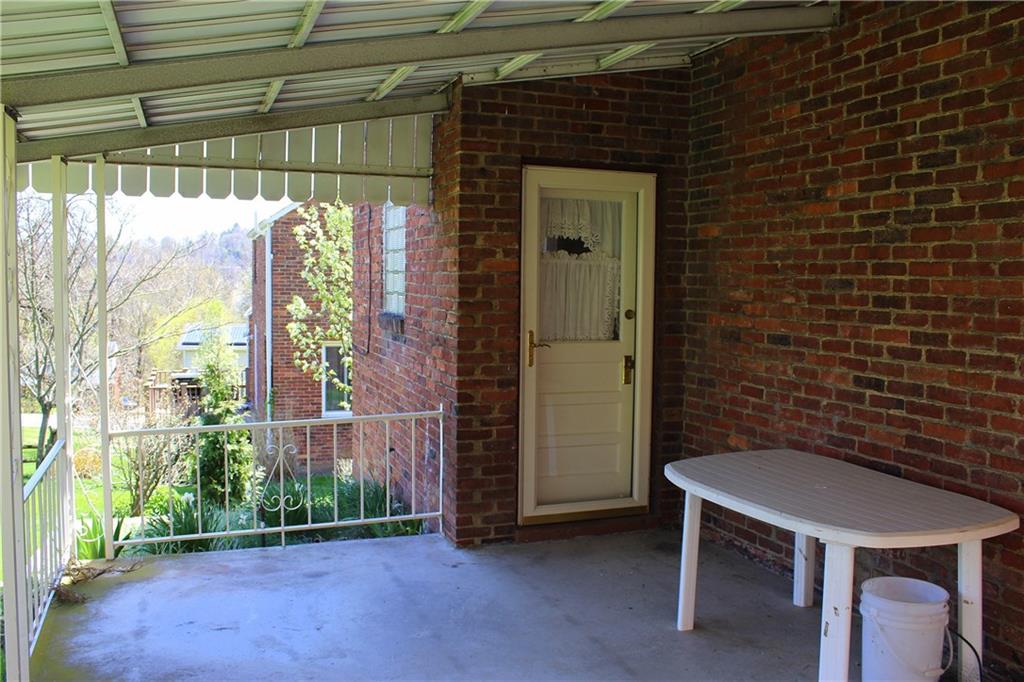 835 Middle Road Pittsburgh, PA 15234 - Photo 15 of 21 Rear covered patio overlooking the back yard.