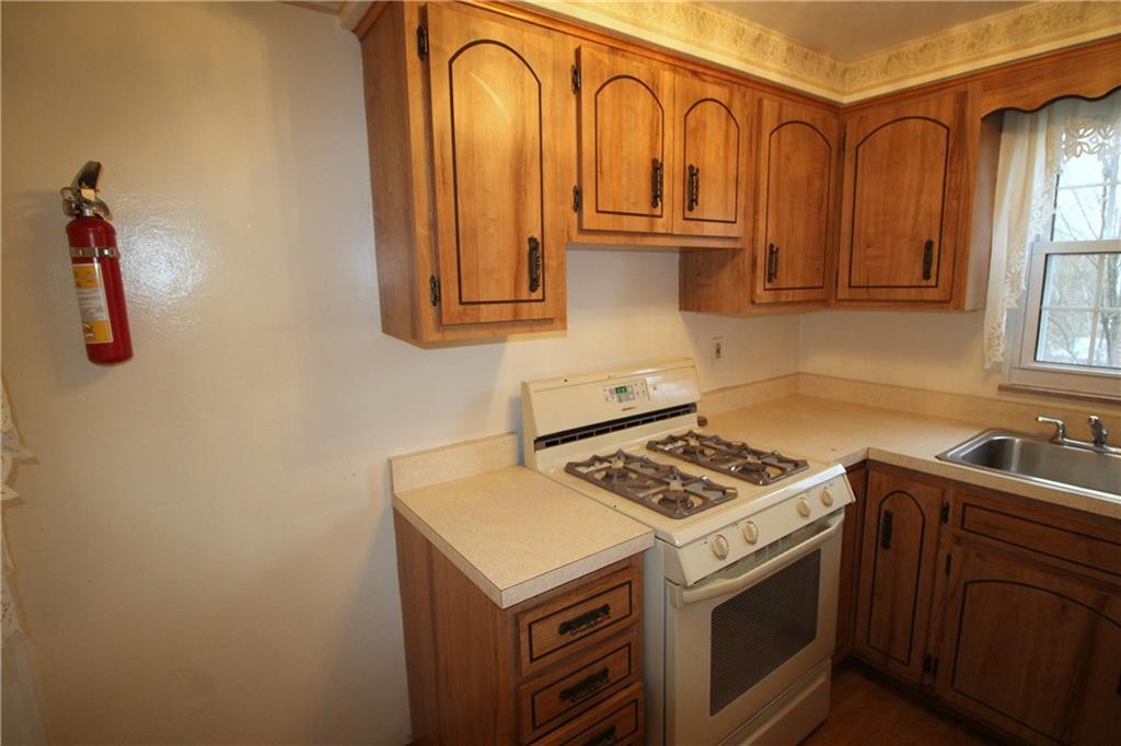 835 Middle Road Pittsburgh, PA 15234 - Photo 8 of 21 The kitchen also has a door to the rear patio.