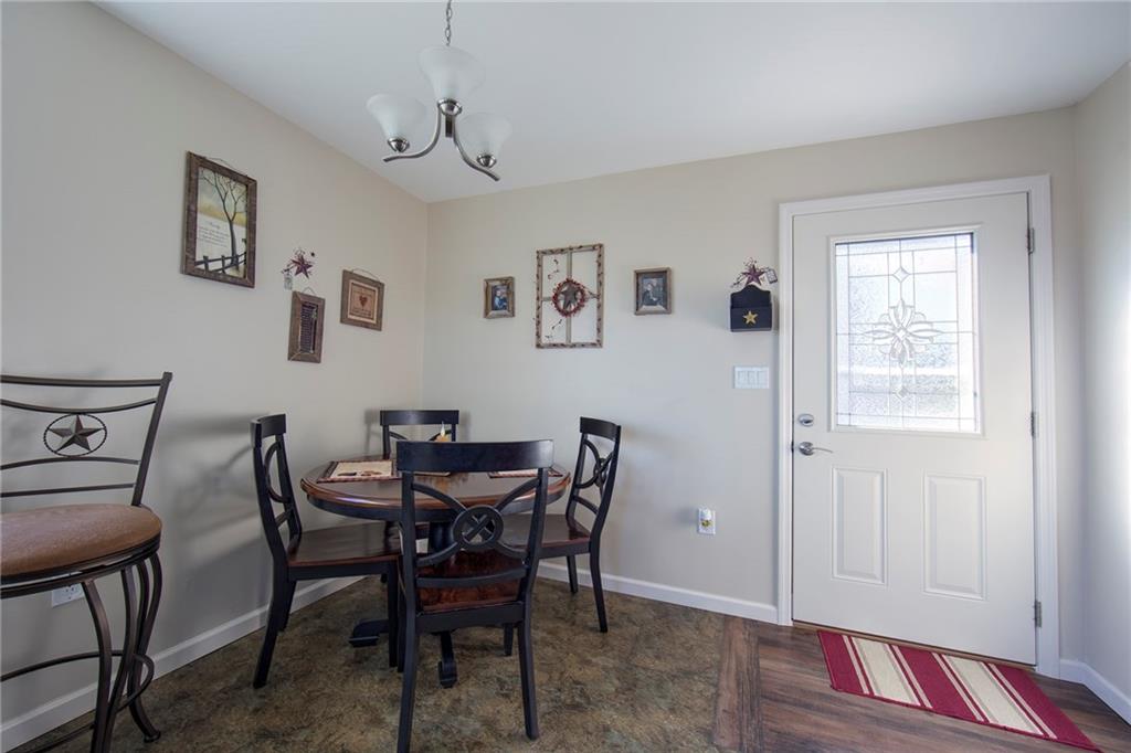 1718 Rte 481 Charleroi, PA 15022 - Photo 11 of 24 DINING AREA IN KITCHEN WITH SIDE DOOR TO THE DECK FOR CONVENIENT GRILLING