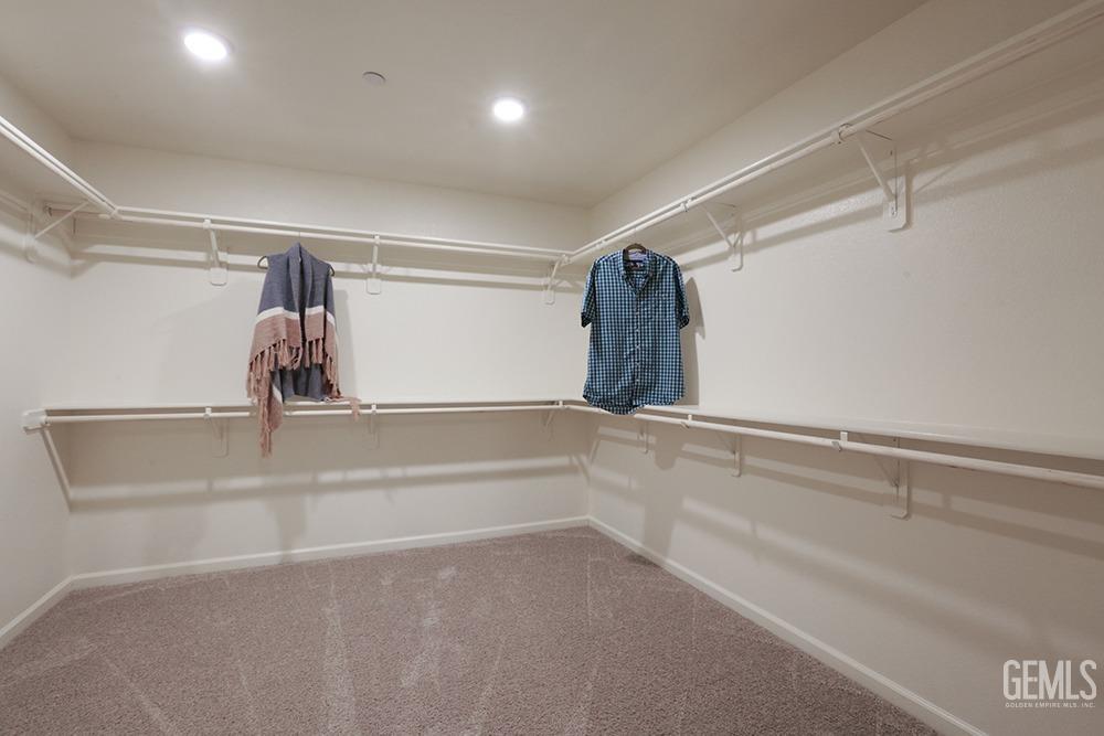 Undisclosed Address Bakersfield, CA 93313 - Photo 20 of 30 a view of walk in closet