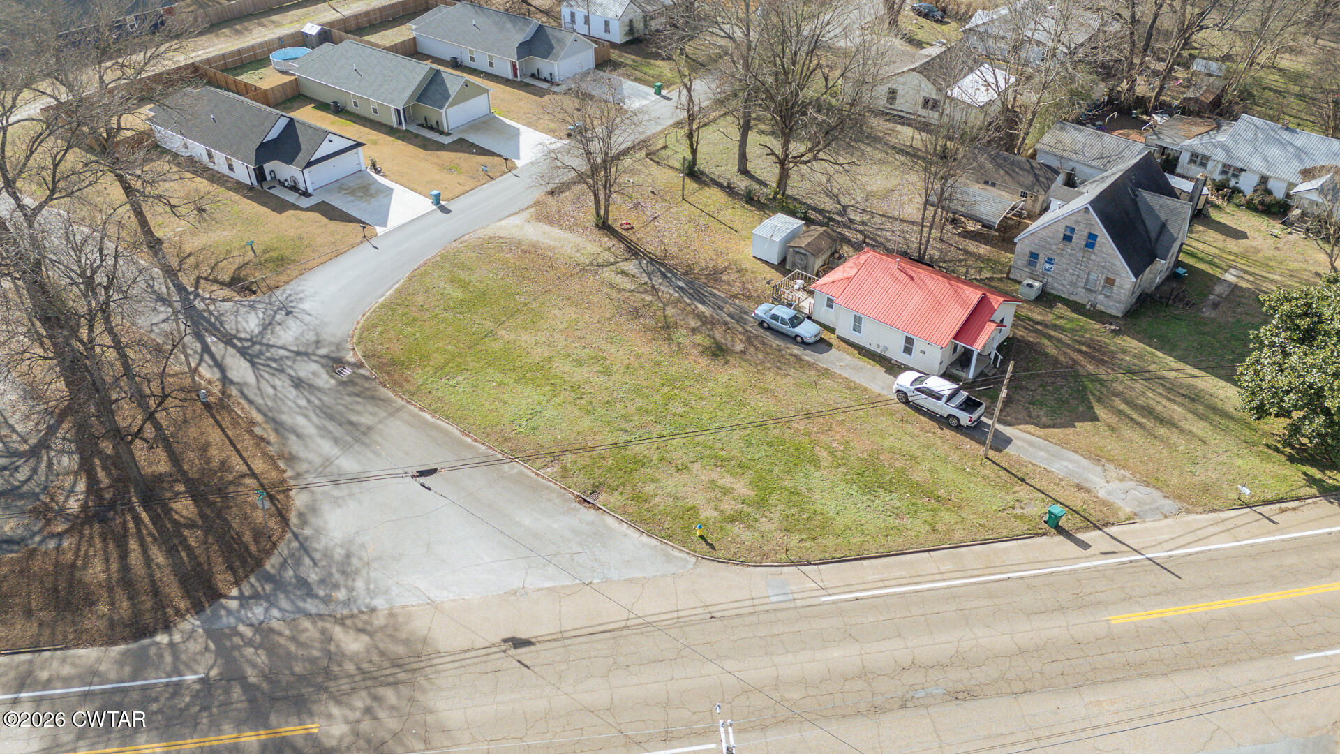3019 North Main Street Milan, TN 38358 - Photo 2 of 16 an aerial view of residential houses with outdoor space