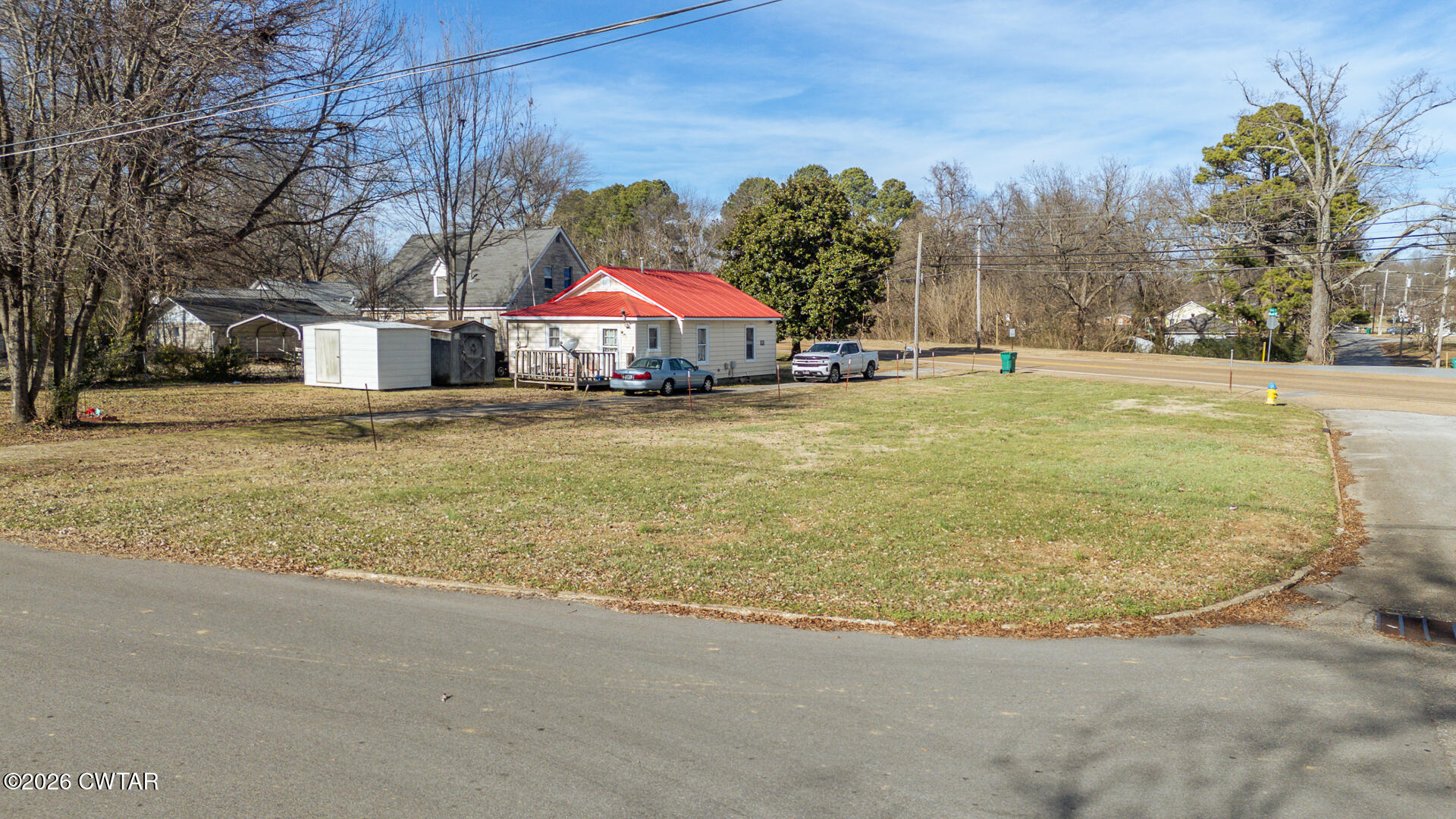 3019 North Main Street Milan, TN 38358 - Photo 8 of 16 a view of a house with a yard