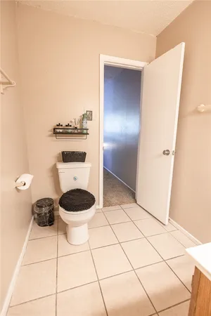 a bathroom with a toilet and a sink