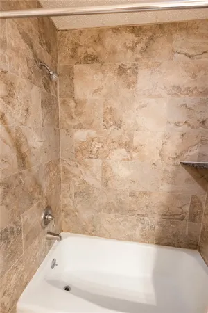 a bathroom with a bathtub