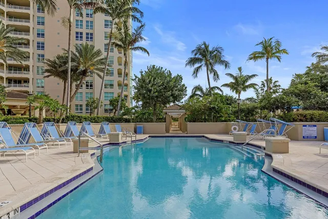 a view of a swimming pool with a patio