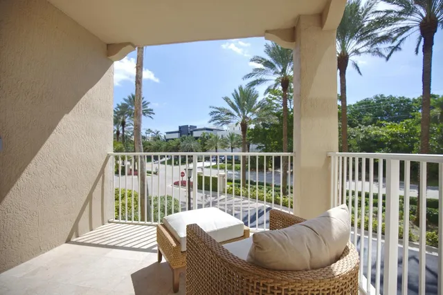 a balcony with wooden floor