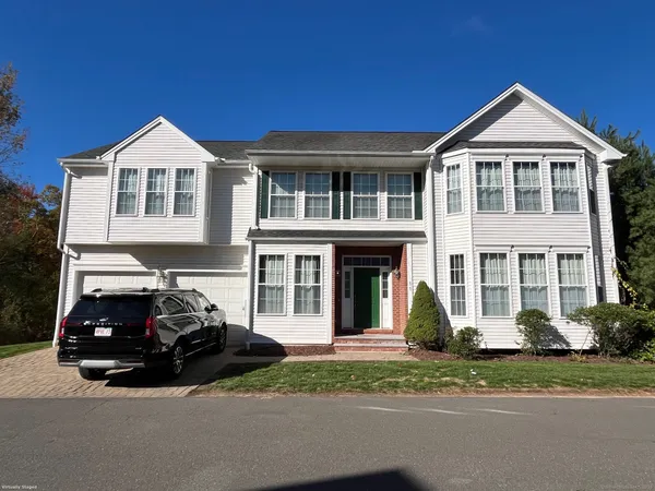 a car parked in front of a house