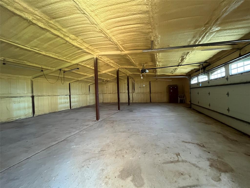 60 Cobler Road Collinsville, TX 76233 - Photo 2 of 17 30 x 36 ft insulated metal building with two car garage door