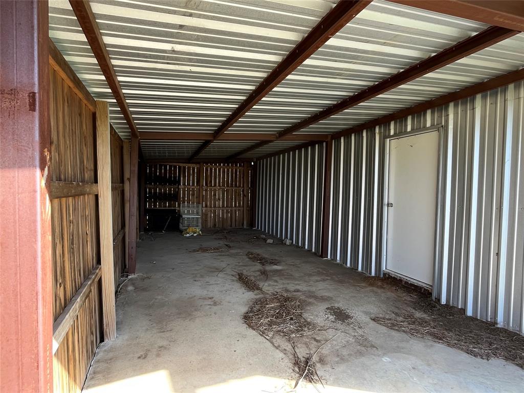 60 Cobler Road Collinsville, TX 76233 - Photo 4 of 17 12.5 x 30 ft covered carport with entry into insulated metal building