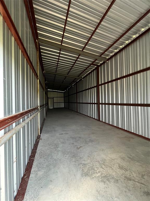 60 Cobler Road Collinsville, TX 76233 - Photo 8 of 17 12 x 60 ft. metal building with standard entry door on each end