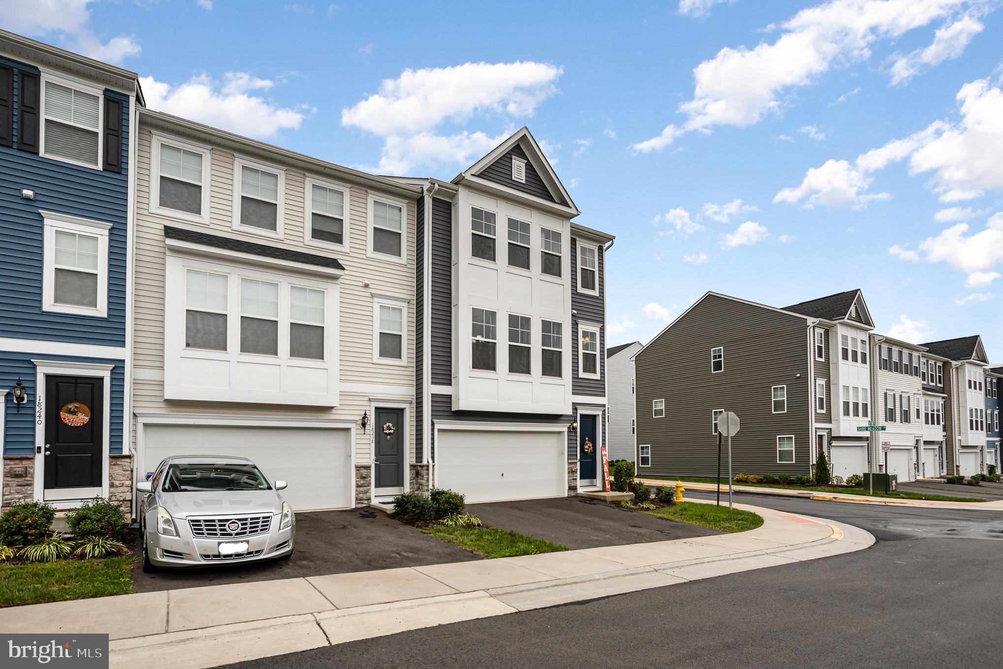 18236 Summit Pointe Drive Triangle, VA 22172 - Photo 2 of 36 a car parked in front of a white building