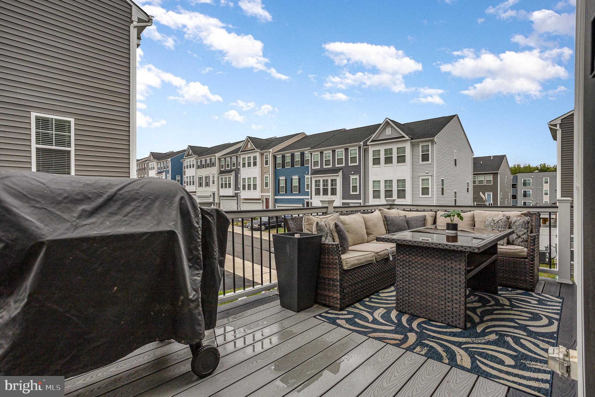 18236 Summit Pointe Drive Triangle, VA 22172 - Photo 34 of 36 a terrace of a house with outdoor seating