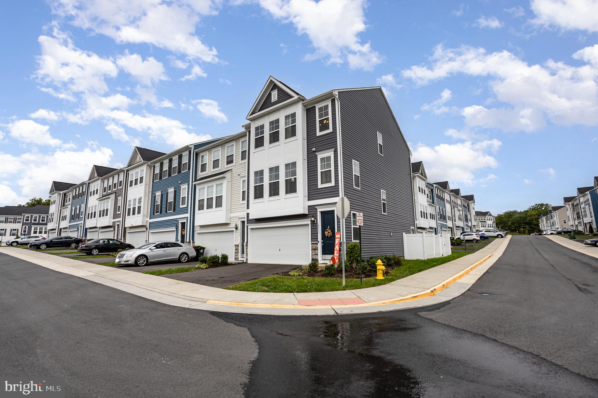 18236 Summit Pointe Drive Triangle, VA 22172 - Photo 4 of 36 a view of a street with tall buildings