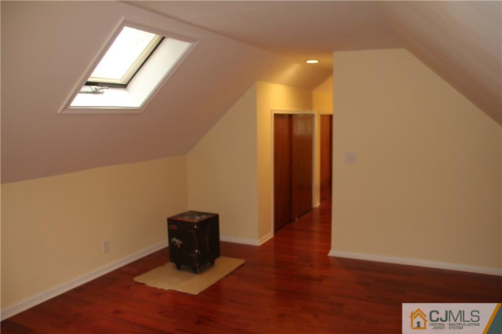 21 Channing Road East Brunswick, NJ 08816 - Photo 15 of 25 a view of a livingroom with wooden floor