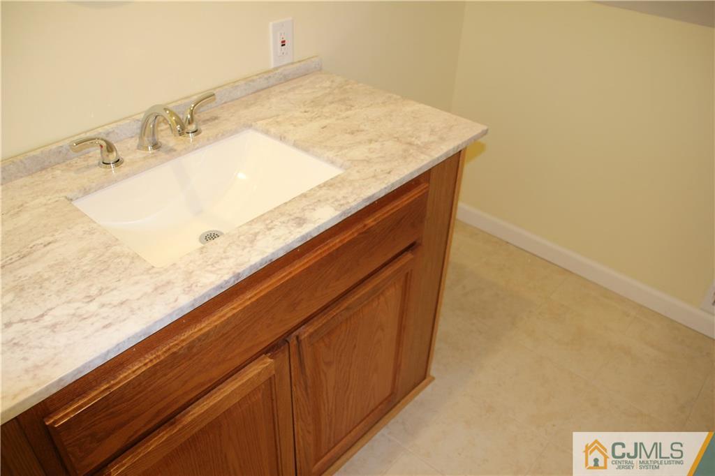 21 Channing Road East Brunswick, NJ 08816 - Photo 10 of 25 a close up of a sink