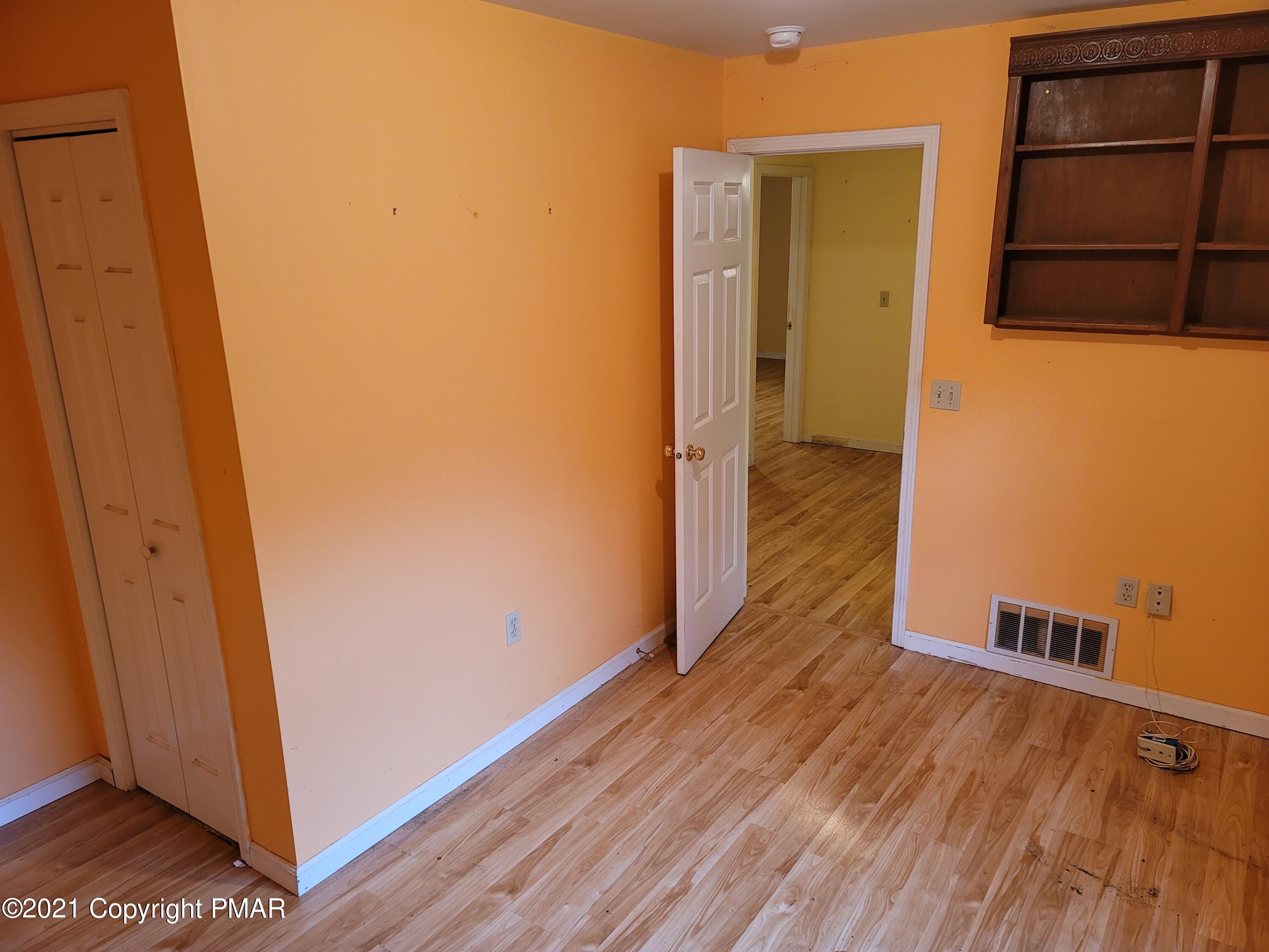 3388 Spruce Cabin Road Cresco, PA 18326 - Photo 17 of 33 a view of a room with wooden floor