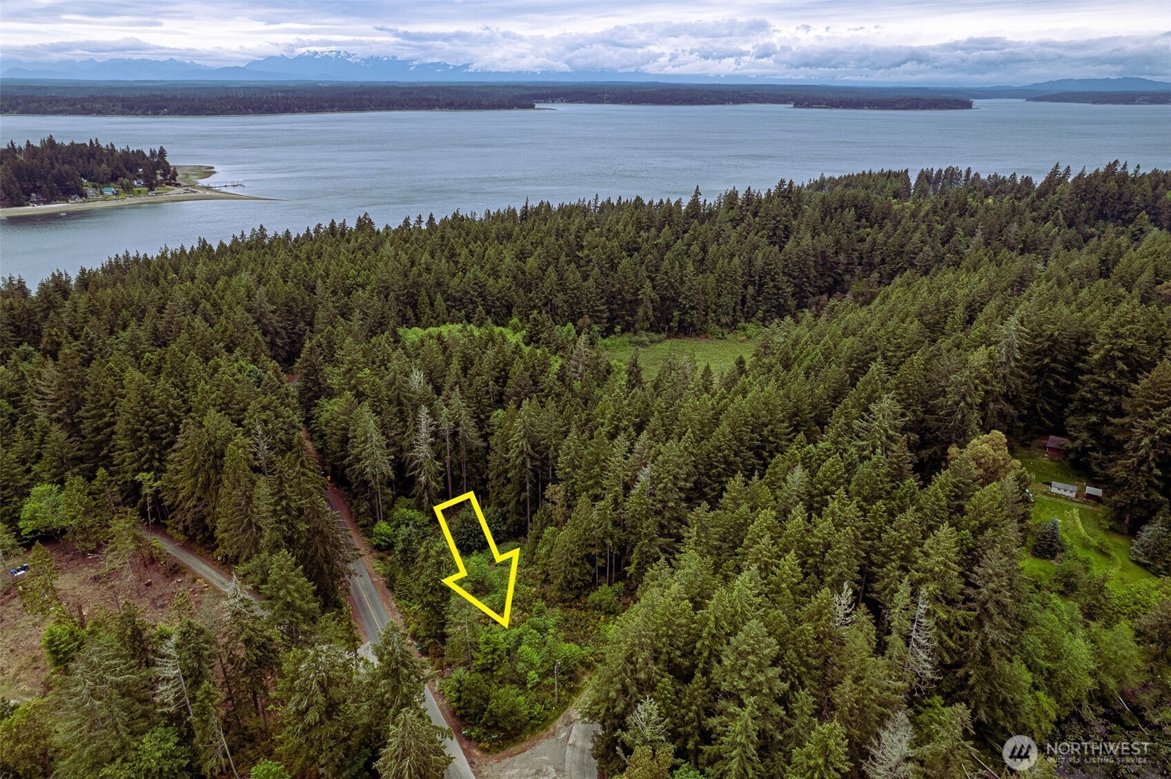 811 Herron Road Northwest Lakebay, WA 98349 - Photo 1 of 11 a view of a lake and mountain