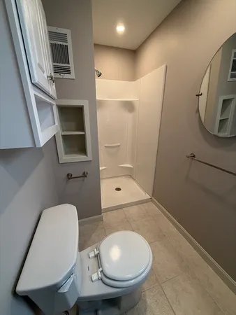 a bathroom with a toilet and a sink
