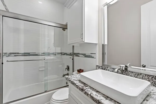 a bed room with furniture and wooden floor