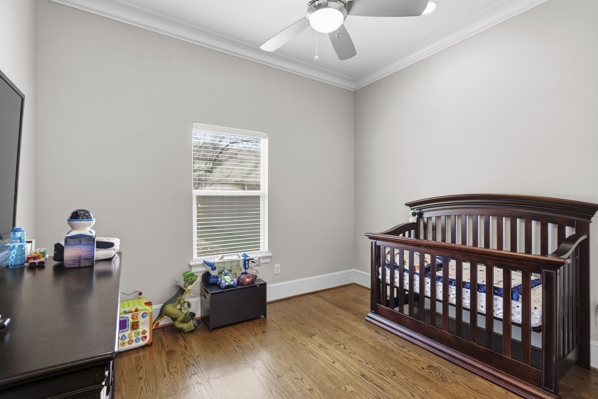 1938 Pech Road Houston, TX 77055 - Photo 20 of 39 a bed room with furniture and wooden floor
