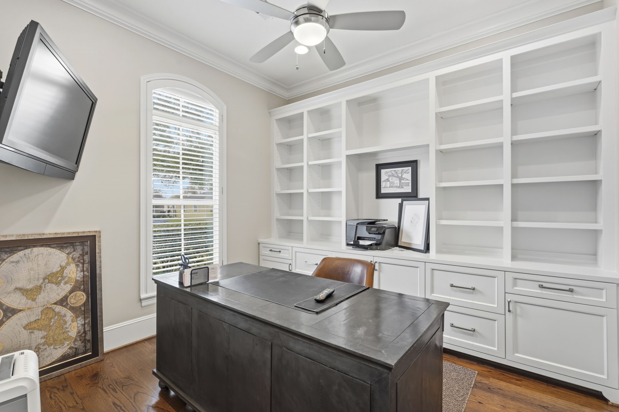 1938 Pech Road Houston, TX 77055 - Photo 2 of 39 a view of a workspace with furniture and a window