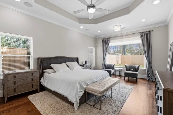 a bathroom with a granite countertop double vanity sink mirror and