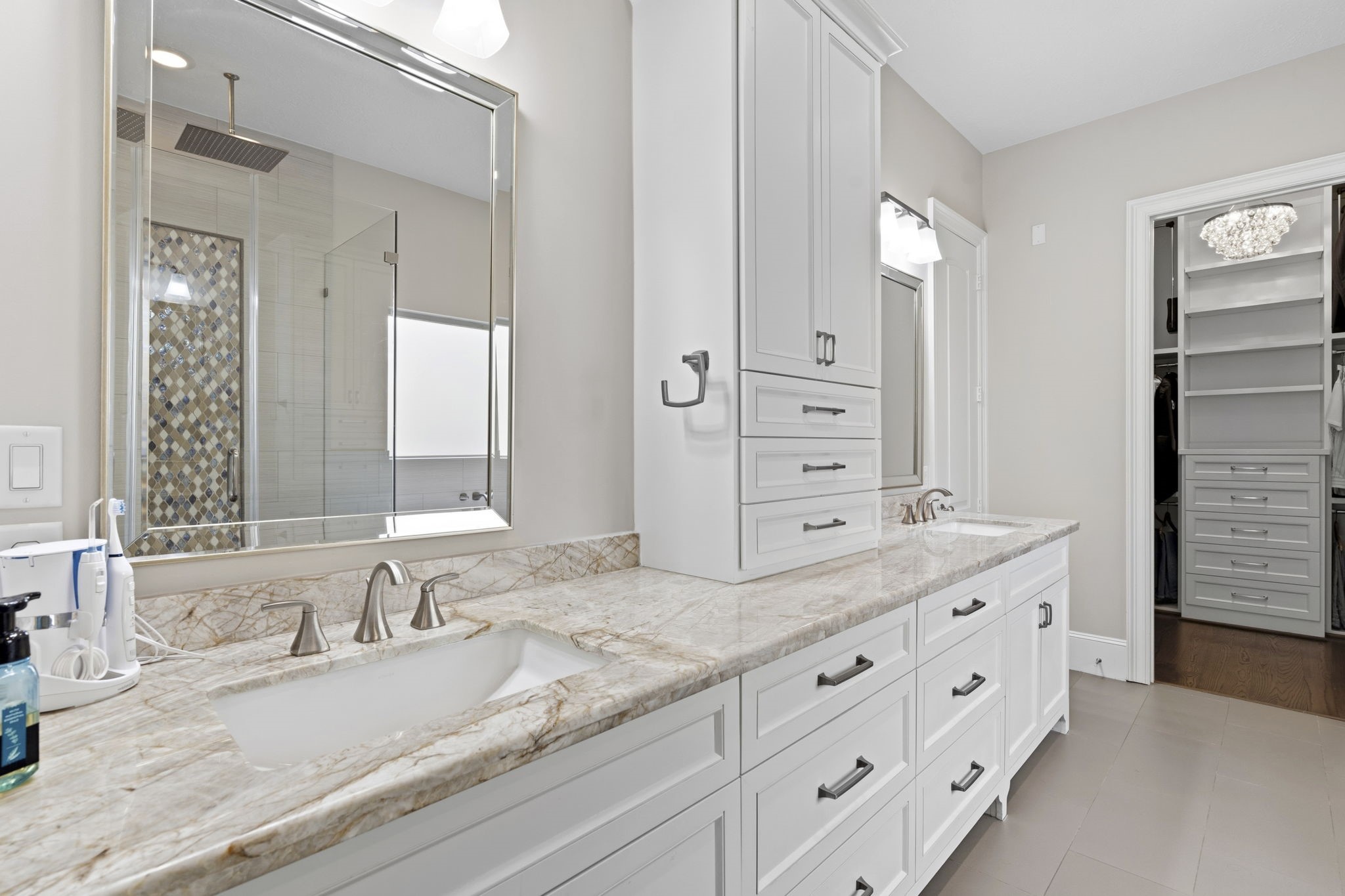 1938 Pech Road Houston, TX 77055 - Photo 22 of 39 a bathroom with a granite countertop double vanity sink mirror and