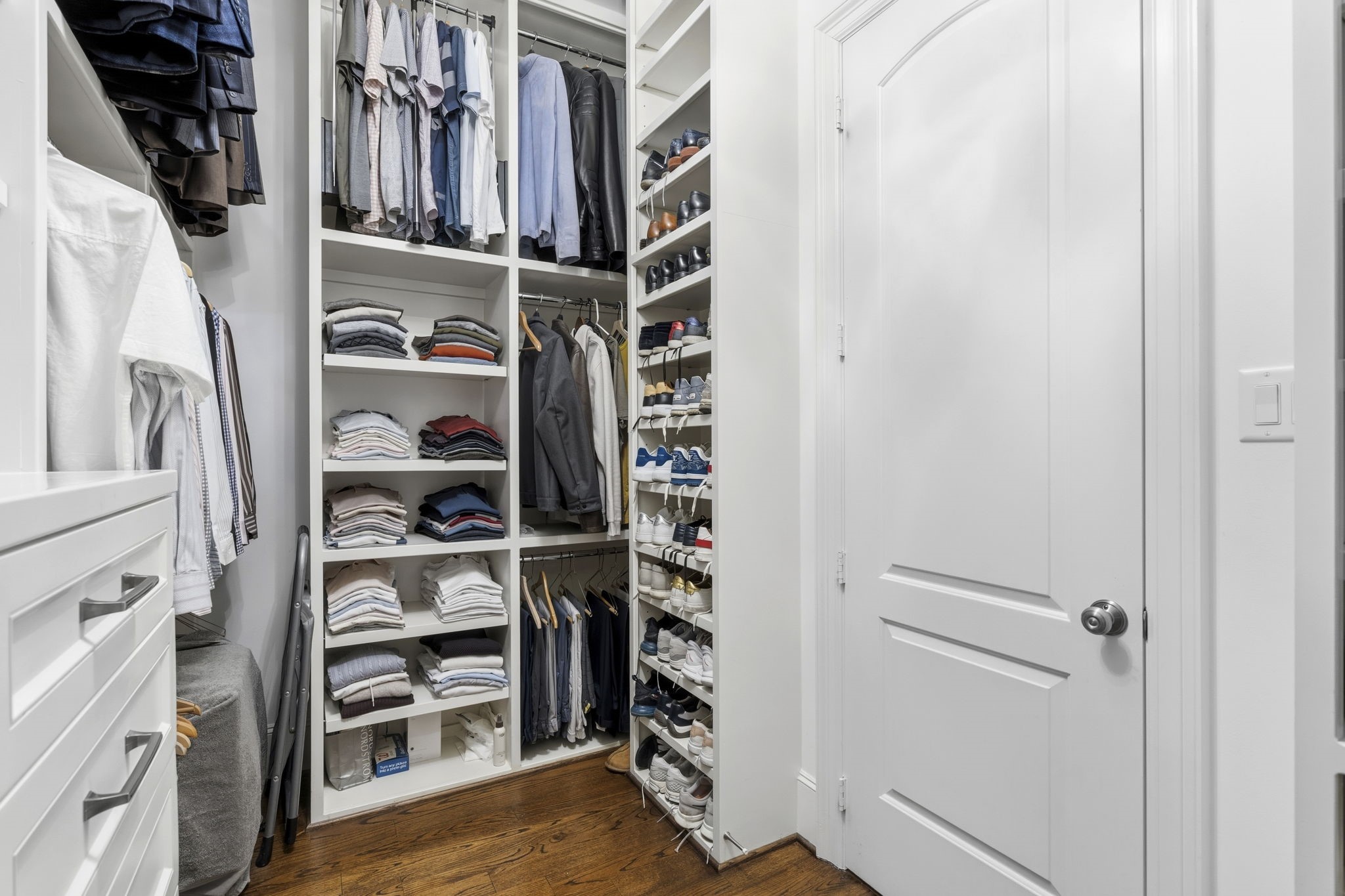 1938 Pech Road Houston, TX 77055 - Photo 24 of 39 a view of walk in closet with clothes and shoes