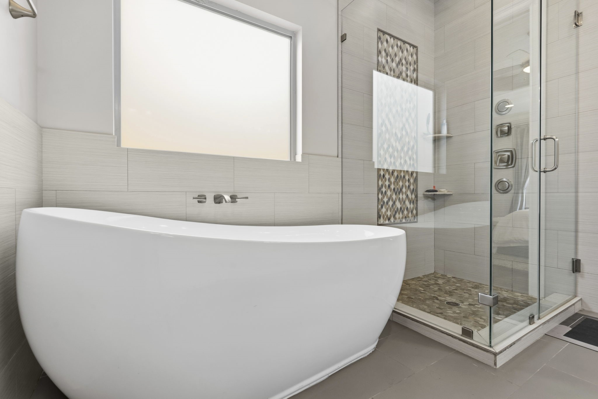 1938 Pech Road Houston, TX 77055 - Photo 25 of 39 a bathroom with a bathtub and shower