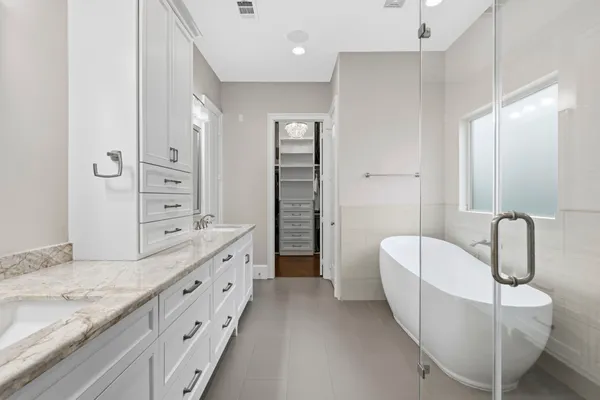 a view of a room with wooden floor and chair
