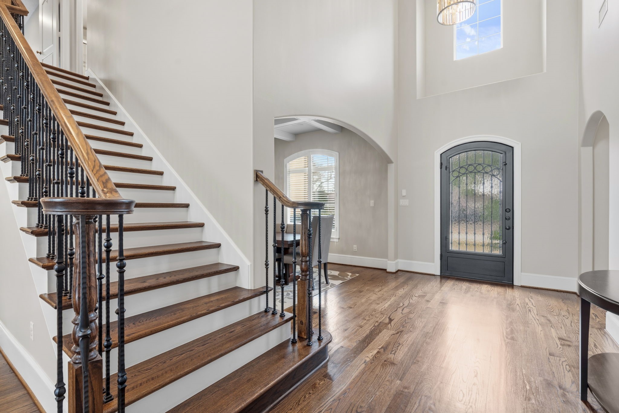 1938 Pech Road Houston, TX 77055 - Photo 6 of 39 a view of a hallway with wooden floor and entryway